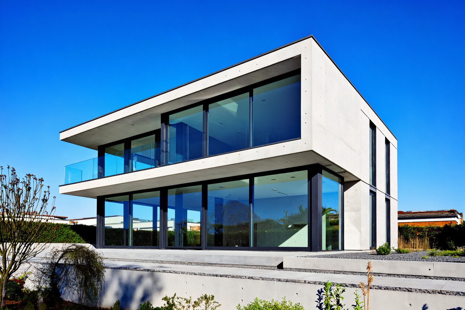 Architecture example prompt result showing a modern residential building with concrete, glass, and black metal framing